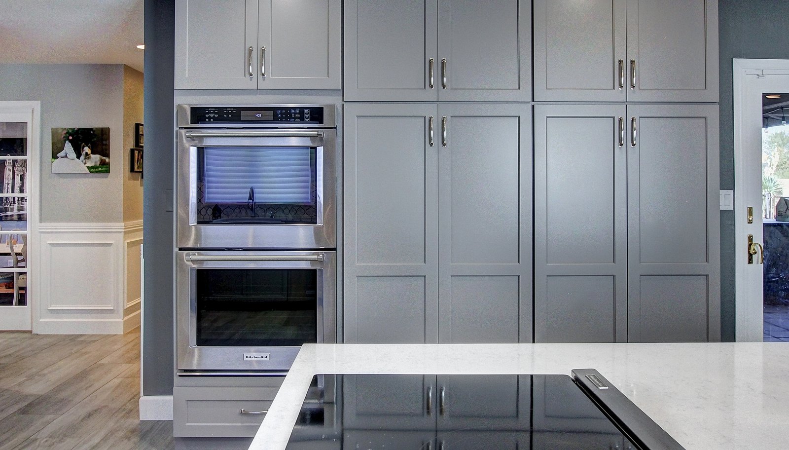 Custom kitchen with double ovens and gray cabinetry in Mesa, AZ