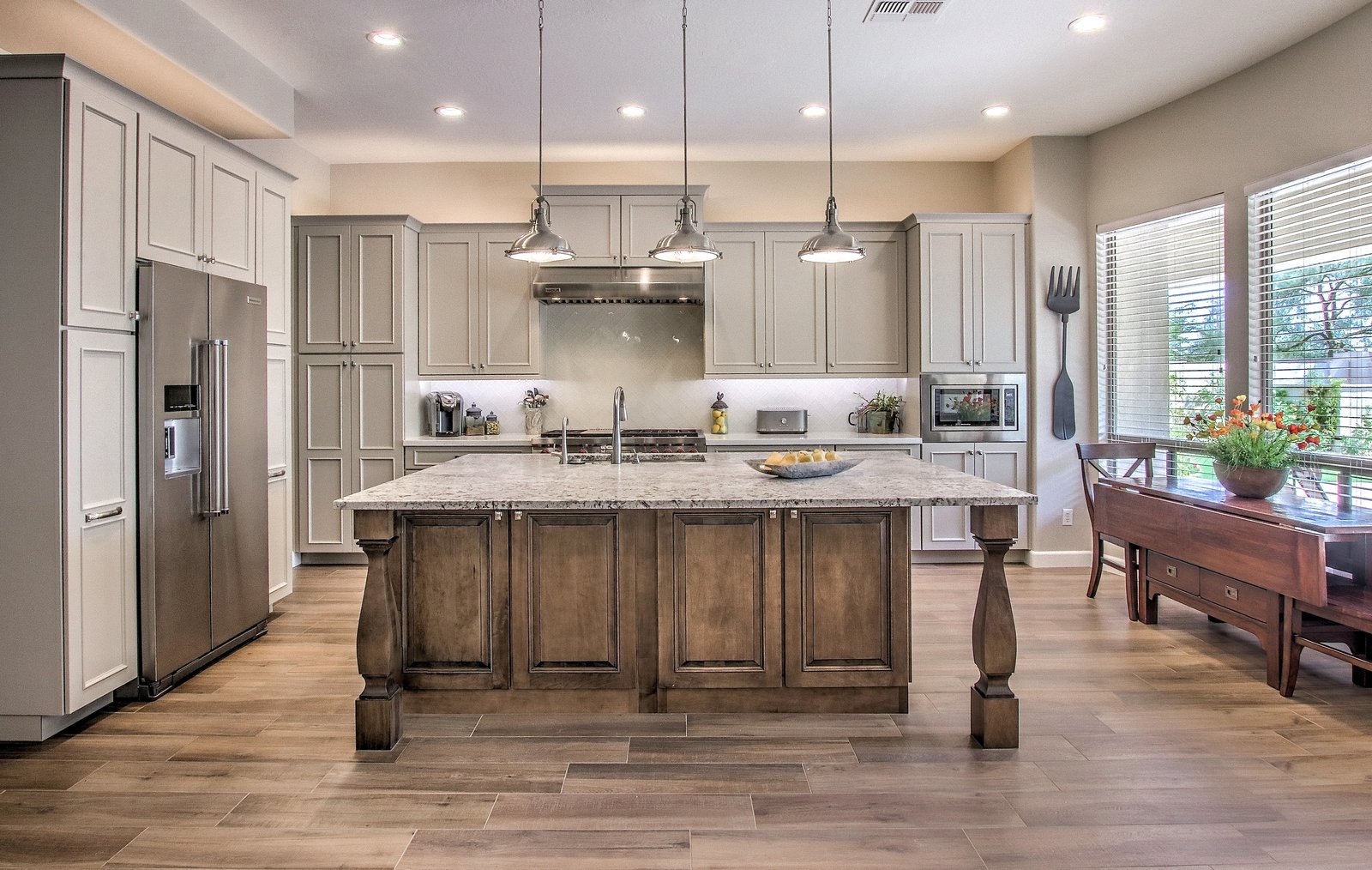 Full kitchen remodel with custom island and stainless appliances in Mesa, AZ