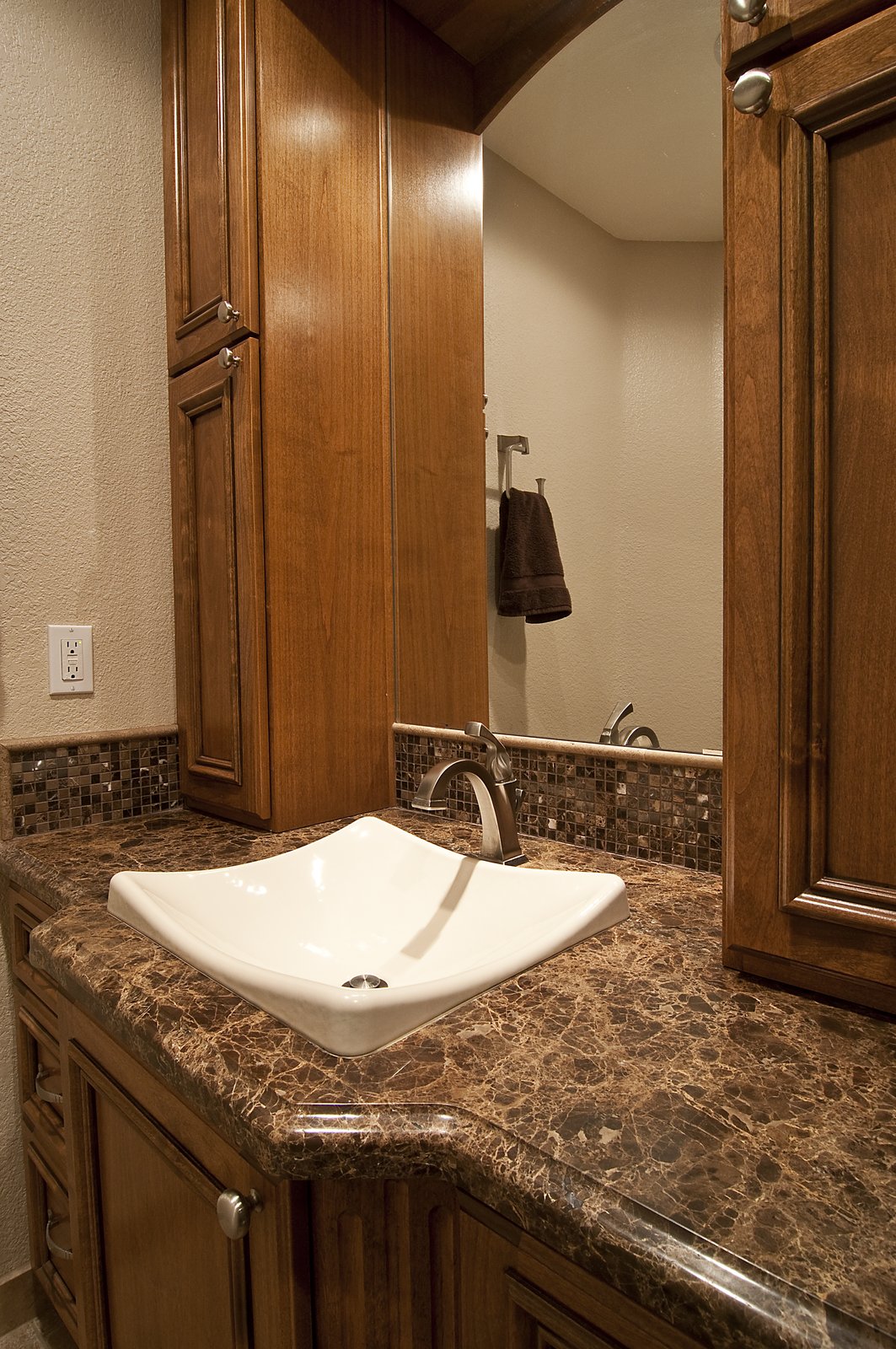 Bathroom vanity with vessel sink and marble countertop, remodel in Mesa, AZ